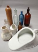 A collection of mixed glass and ceramic medical / pharmaceutical associated vessels