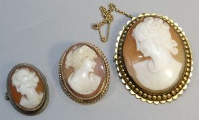 Three cameo brooches comprising 9ct yellow gold framed, a larger unmarked yellow-metal framed