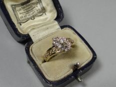 An 18ct yellow gold diamond cluster ring