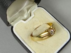 An 18ct yellow gold small-diamond solitaire ring, 5.5 gms