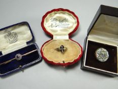 A black enamel and rose-cut diamond mourning ring; together with a sapphire and diamond floral bar
