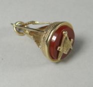 A 9ct yellow gold and cornelian Masonic fob pendant