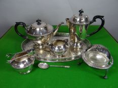 A four-piece EPNS tea-service, EPNS breakfast warmer and oval EPNS tray