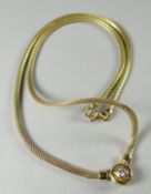 An 18ct yellow gold necklace with diamond solitaire pendant, 16.3 gms