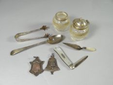 A parcel of small silver items including a novelty silver and mother-of-pearl bookmark in the form