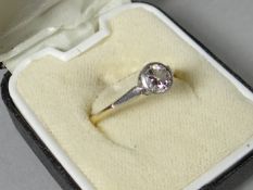 An 18ct yellow gold diamond solitaire ring with illusion setting