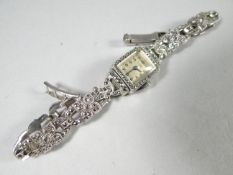 A vintage ladies 'Vidar' cocktail watch with stainless-steel back and silver and tiny-diamond