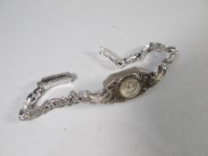 A vintage ladies 925 silver cocktail bracelet watch by BAUME, embellished with tiny diamonds, 23.5