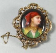 A Victorian locket swivelling within, a believed 9ct, scrolling mount, the obverse having a finely