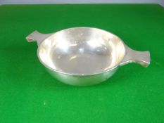 A silver quaiche of plain form, Chester mark (other hallmarks worn), retail mark for W Long & Co,