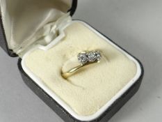 18ct gold three stone diamond ring