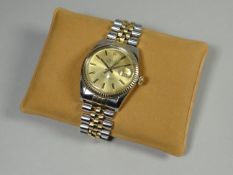 A gentleman's Rolex Oyster Perpetual Datejust mixed metal wristwatch, having a champagne batonned