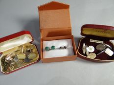 A parcel of gentleman's cuff-links and two pairs of stud earrings
