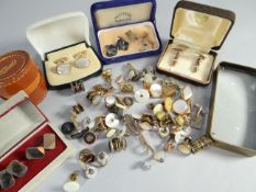 A parcel of gentleman's accessories, mainly cuff-links with some being silver