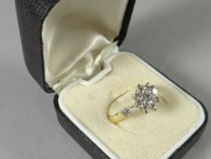 An 18ct yellow gold floral cluster diamond ring