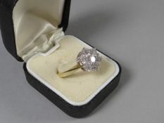 An 18ct seven stone diamond floral cluster ring, approximate visual estimate 2cts total