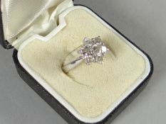 A platinum ring with floral diamond arrangement