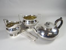 A George lll / lV three piece near-matching silver tea-service, London, teapot (1818), sugar basin