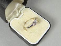 A modern 18ct white gold oval-cut diamond solitaire ring, 4.28gms, visual estimate approx 0.7ct