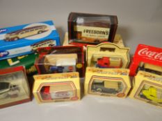 A quantity of boxed toy vehicles including Lledo