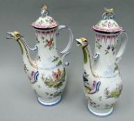 A pair of late eighteenth century Marseilles faience lidded oil jugs by Veuve Perrin, each with