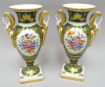 A pair of square based Limoges campana-shape vases with twin handles in green glaze with gilt