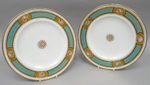 A pair of late-Victorian Staffordshire porcelain plates decorated in gilding and bird's-egg-blue and