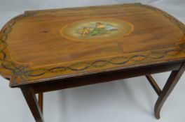 An interesting painted table, the top of shaped oblong form and featuring a centre oval cameo