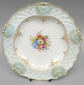 A Royal Worcester white-ground dish having a painted flower posy to the interior and with unusual