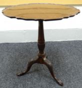 A tilt-top mahogany tripod-table with shaped and galleried top on fluted taper column support