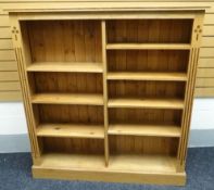 A twentieth century light oak bookcase with inlay decoration constructed of salvaged wood from