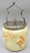 A Locke & Co blush ivory leaf and berry moulded biscuit barrel with EPNS lid and handle, 10 ins high