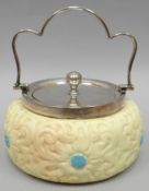 A Locke & Co blush rosette moulded biscuit barrel with turquoise flowers, EPNS lid and handle, 3.5