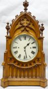 An impressive mid-nineteenth century eight-day Gothic Revival oak 'cathedral' clock of architectural