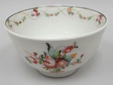An eighteenth-century New Hall tea-bowl, floral decorated to the interior and extrerior