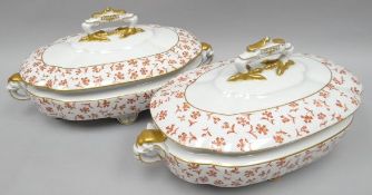 A pair of Royal Worcester footed soup-tureens of shaped oval-form profusely decorated with rust