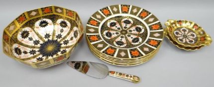 Six Royal Crown Derby Imari patterned large plates, 10.25 ins diam, a pair of matching twin-