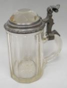 A late nineteenth century glass and pewter Austrian bier stein, inscribed to the lid in German 'On