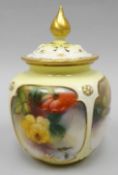 A Royal Worcester 'Hadley Ware' panelled pot pourri with pierced lid having a gilded finial, the