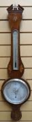 A Sheraton style inlaid mahogany aneroid banjo barometer with silvered dials and brass bezel, 38 ins