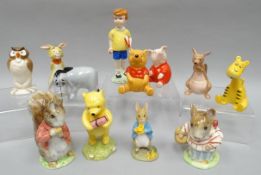 A set of nine boxed 'Winne the Pooh' figures including Christopher Robin, Roo and Owl