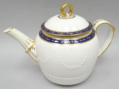 A late eighteenth century circular-based Derby porcelain teapot having a moulded body, gilt and blue