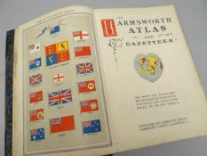 A volume of 'The Harmsworth Atlas and Gazetteer', published at Carmelite House, in leather