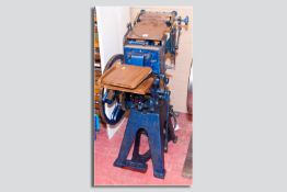A Derby 9 x 7 power operated printing press