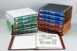 A fine collection of sixteen Stanley Gibbons stamp albums, all superbly filled and all featuring