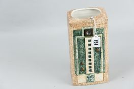 An excellent Troika pottery rectangular vase having a sandstone body with raised and incised Aztec