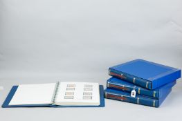 Four Stanley Gibbons stamp albums, well filled with British Commemoratives 1953-1990 (proceeds to Ty
