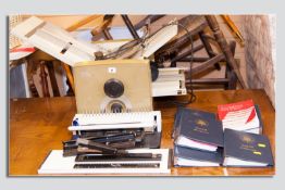 A Rexel Versifold power operated folding machine, an office hand operated binder, punches etc and