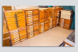 Nine eight drawer founts chests, a six drawer example and a quantity of plastic drawers of similar