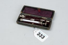 An early 20th Century boxed medical syringe with needles